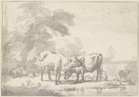 Zwei Kühe und einige Schafe, die Hirtin sitzt mit einem Kind unter einem Baum