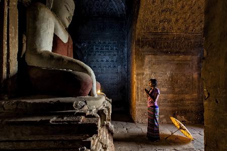 Young lady and umbrella in pagoda