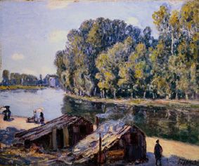 cabanes sur le Canal Loing au soleil à Alfred Sisley