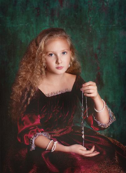 Portrait of a girl with a necklace