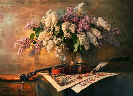 Still life with violin and lilac flowers