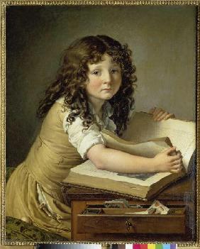 Jeune fille regardant d'un livre d'image.