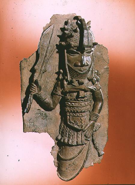 Plaque depicting the royal god Oba holding the eben sword in his right hand, dancing to honour his a à Anonyme