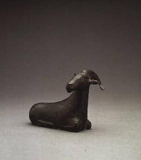 Bronze figure of a recumbent goat