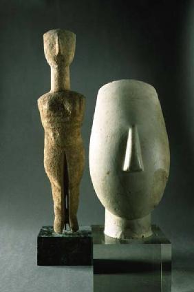 (Lto R) Figurine with crossed arms, Cycladic; head of a woman, fragment of a statue,from Keros