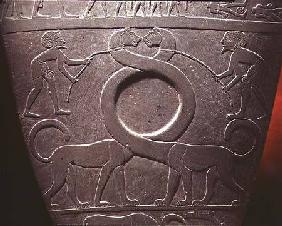 The Narmer Palette: ceremonial palette depicting a pair of long-necked cats being held on leashes