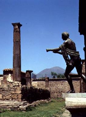 Statue of Apollofrom the Temple of Apollo with Vesuvius in the background