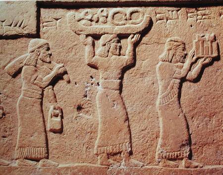 Relief depicting porters laden with gifts à Assyrien