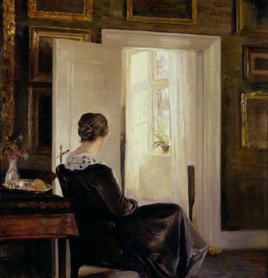 A woman seated near a door à Carl Holsoe
