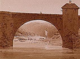 Paysage de fleuve avec le pont de pierre à Caspar David Friedrich