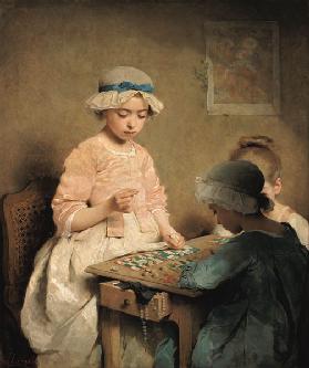 Enfants avec le jeu de Lotto