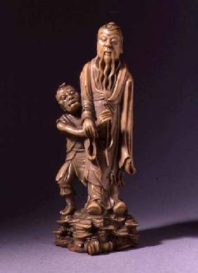Figure of Zhong Kui, supported by a demon servant, Qing dynasty