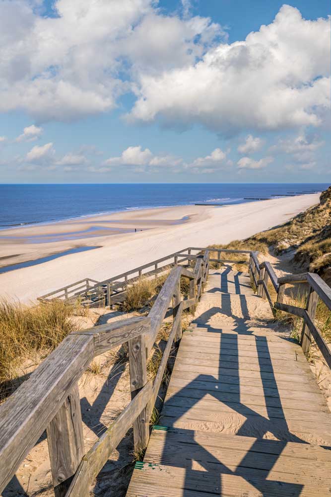 Wooden path to the west beach in Kampen à Christian Müringer