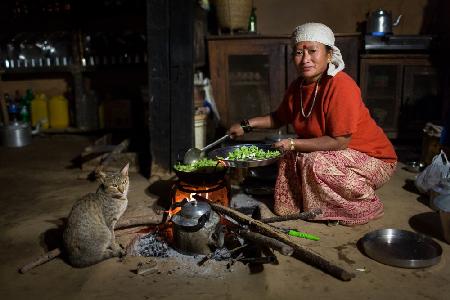 Traditional Nepal woman cooking