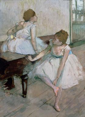 Two dancers resting