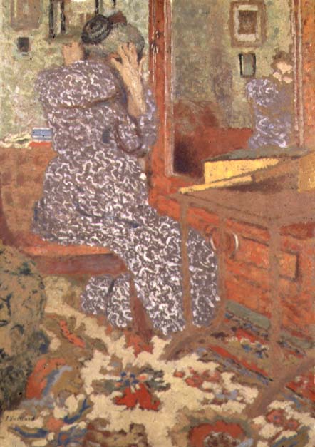Madame Vuillard Arranging her Hair, 1900 (board)  à Edouard Vuillard