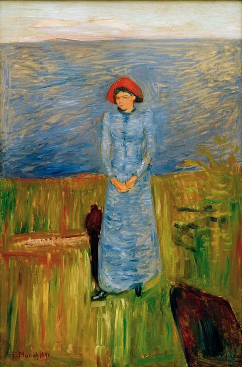Woman with red hat at fjord à Edvard Munch