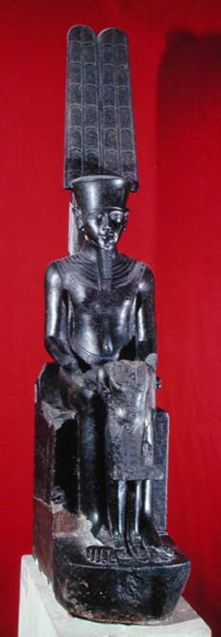 Seated statue of the god Amon protecting Tutankhamun, New Kingdom à Egyptien