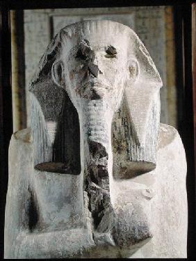 Seated statue of King Djoser (2630-2611 BC) from the Mortuary Temple beside the Step Pyramid of Djos