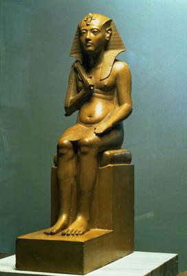 Seated statue of a pharaoh, New Kingdom (stone) à 18ème dynastie égyptienne