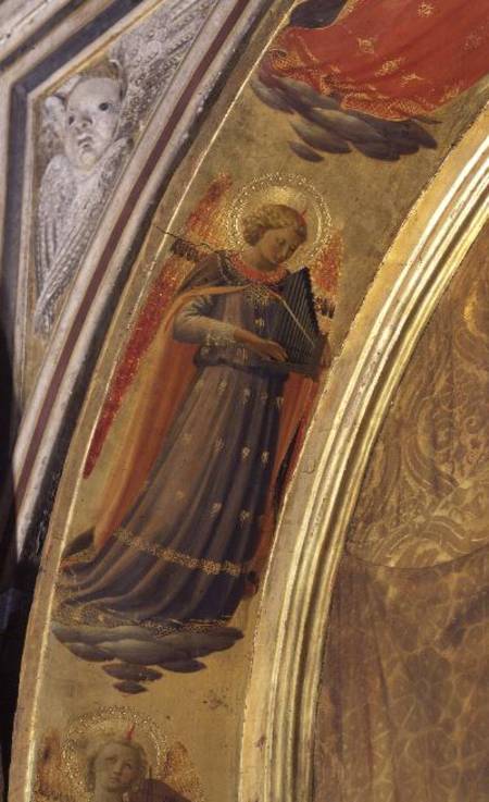 Detail from the side of the Linaivoli Triptych showing an angel holding a portative organ à Fra Beato Angelico