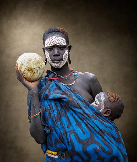 Surma tribe young mother with baby