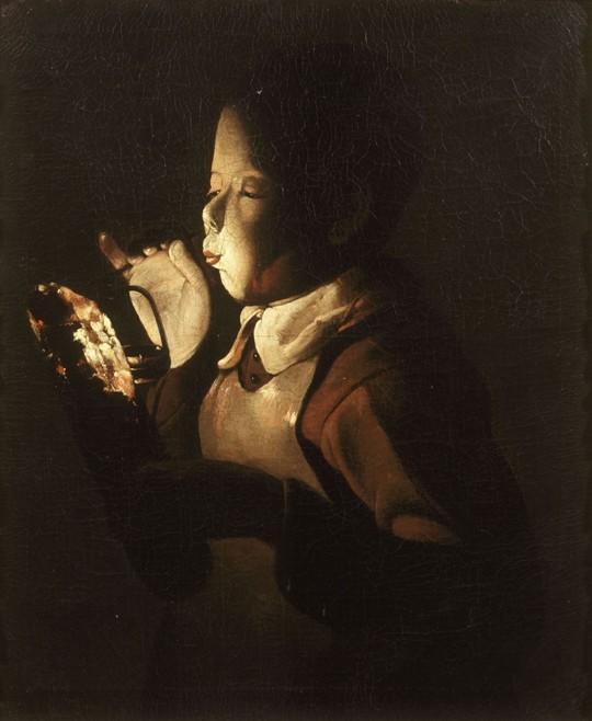 Boy Blowing at Lamp à Georges de La Tour