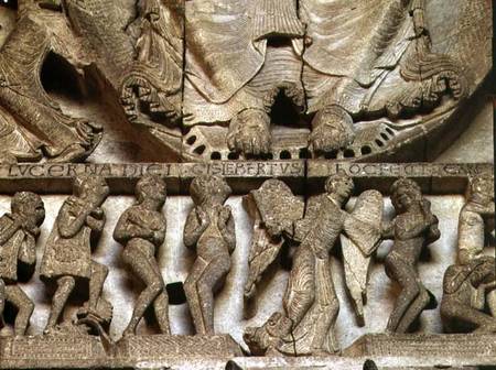 West Portal tympanum depicting the Last Judgement: detail of Christ's feet, an angel and mortals à Gislebertus