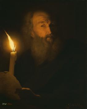 portrait d'un homme barbu dans la lumière de bougie