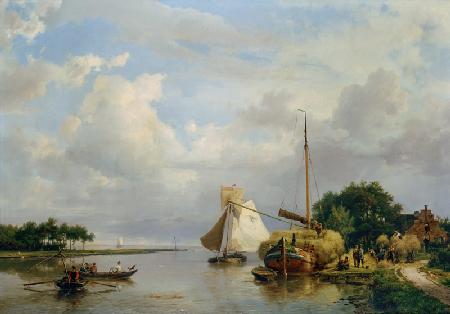 Déchargement d'un barque de foin sur le fleuve Amstel près d'Amsterdam.