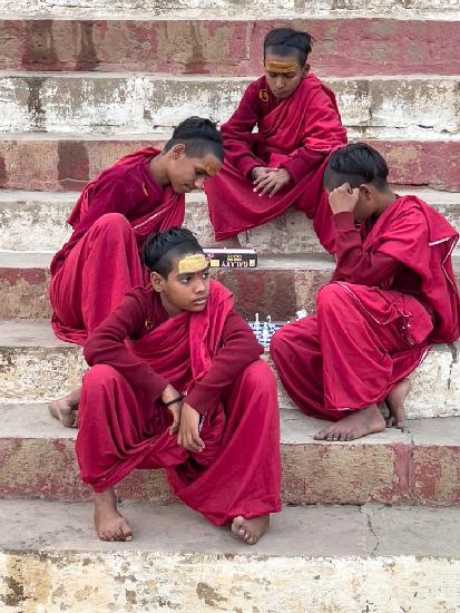 Young monks playing chess