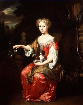 Portrait of a Lady holding her pet King Charles Spaniel