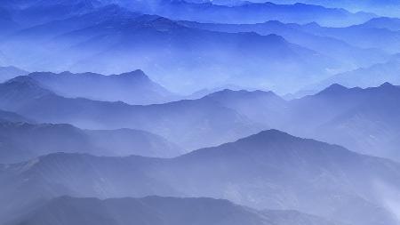 Misty Layers of Himalayan Mountains