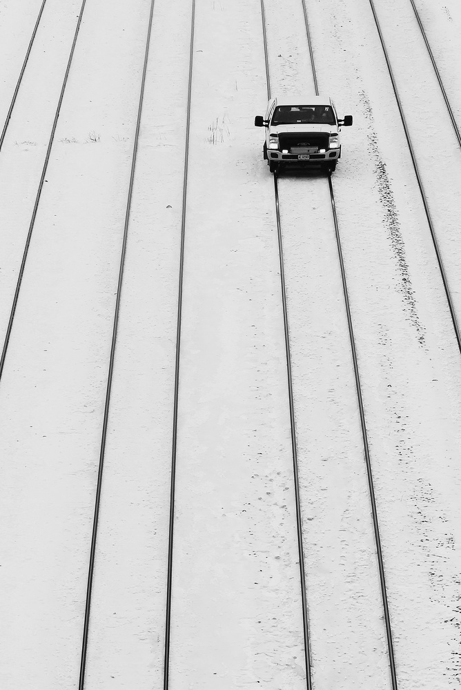 Railroad truck in the snow à Jian Wang