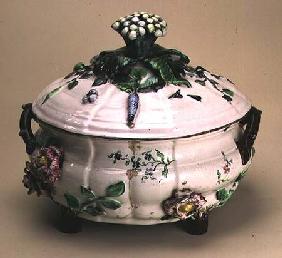 Covered tureen, decorated with applied ornament of flowers and vegetables