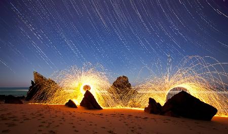 Fire in Star trails