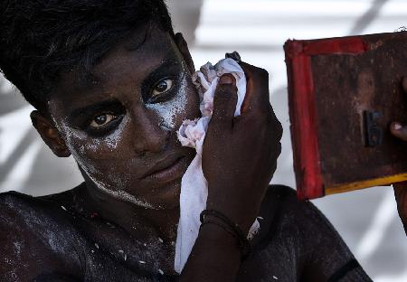 Cleaning up after the Ceremony of Theyyam-Kannur - India