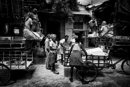 Unloading a truck in the streets of Colcatta - India