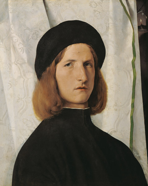 portrait d'un adolescent devant rideau blanc à Lorenzo Lotto