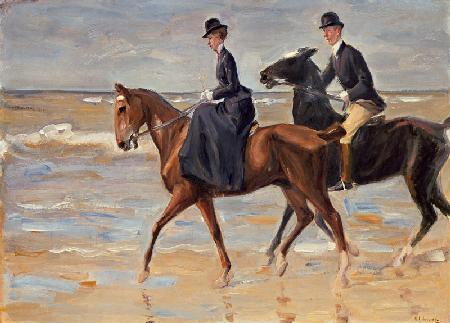 Cavalier et cavalière à la plage