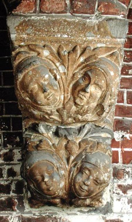 Carved capital depicting four faces, from the south portal à École néerlandaise