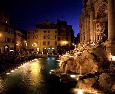 View of the Trevi Fountain at night à Nicola Salvi