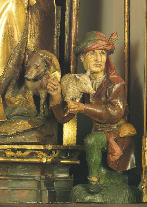 Isenheimer Altar, Detail: Mann mit Schwein (zu Füßen des Hl. Augustinus). à Niklaus von Hagenau
