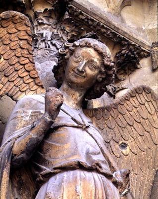 Detail of one of St. Nicaise's angels, sculpture from exterior west facade, 14th century (stone) (se à 