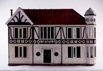 'The Edwardian Villa', a mock-Tudor style dollshouse, view of the front, English, c.1905 (mixed medi