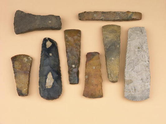 Collection of Neolithic to early Bronze Age weapon heads including Scandinavian stone battle and Dan à 