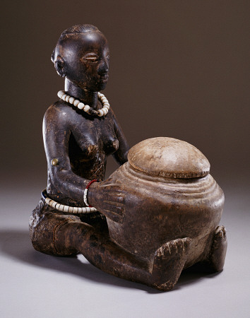 A Luba Figure Of A Seated Female Holding A Round Bowl à 