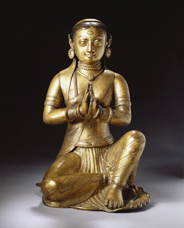 A Nepalese Embossed Gilt-Copper Figure Of A Worshipping Queen, Early 18th Century à 
