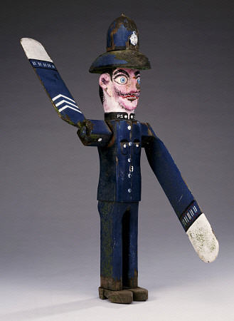 A Polychrome Wood And Metal Whirligig Modelled As A Police Sergeant, 20th Century à 