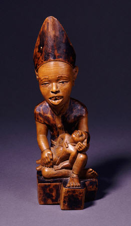 A Yombe Wood Carving Possibly Depicting A King Or Chief Presenting His Son à 